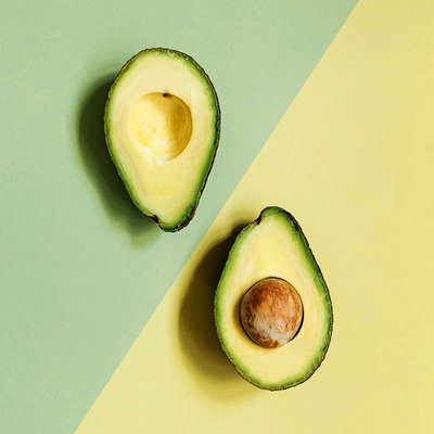 Avocado on colored background